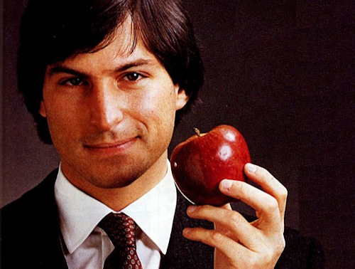 Steve Jobs holding Apple in suit
